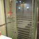 Illustration for article titled Options for a Frameless Shower Door